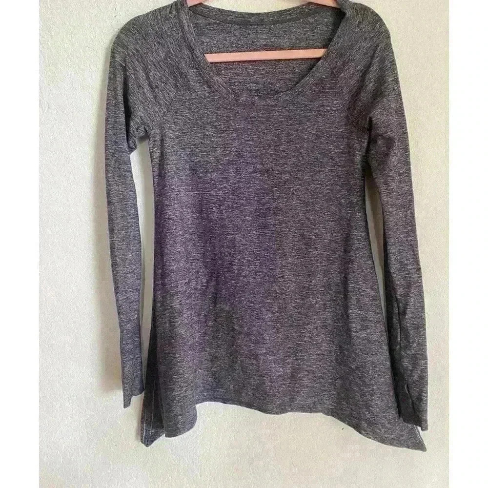 Lululemon Rehearsal Long Sleeve
Heathered Black Swan Athleisure Yoga Top Size 6 - Picture 3 of 11